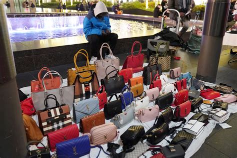 cohen selling fake designer hand bags|designer handbags counterfeit.